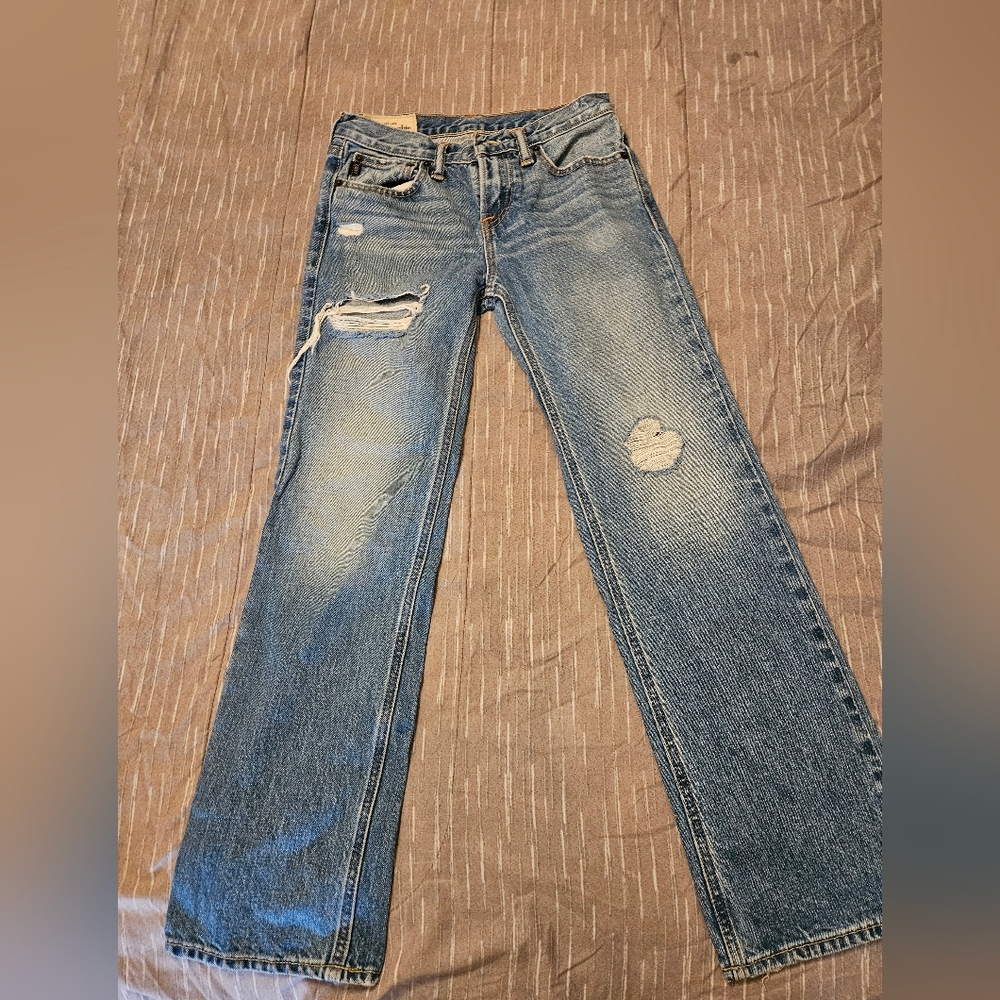 Distressed Blue Jeans